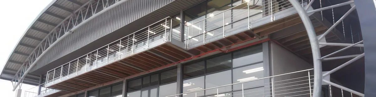 low angle photography of gray building at daytime